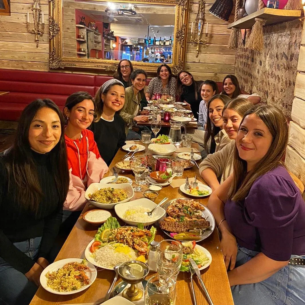 Friends celebrating at Kambis Restaurant Brighton